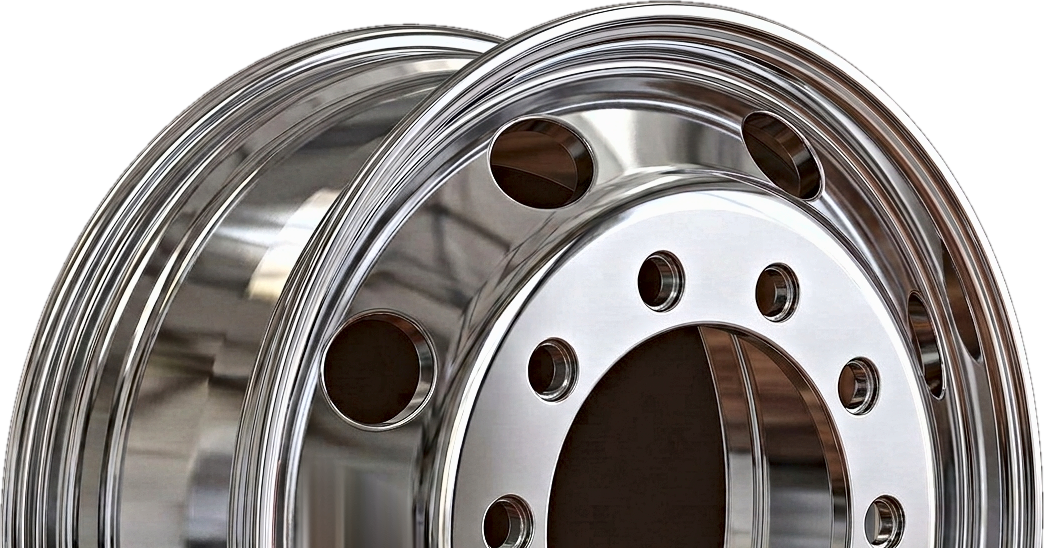 Detail of a high-gloss polished 11.75x22.5 aluminium wheel with a TRAILER TOP decal